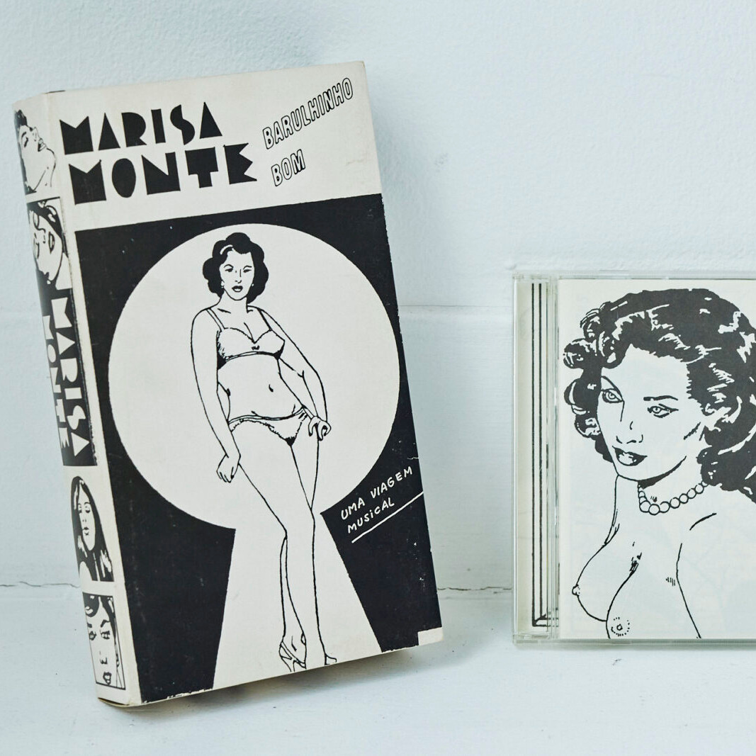 No.14 ブラジルの公務員兼ポルノコミック作家C・ゼフィーロが描くマリーザ・モンチのVHSとCDセット。 – これDOWぞ！ 後編 –